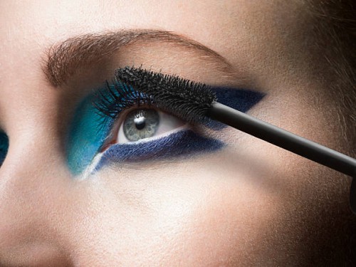 female applying mascara, close up - fashion stock pictures, royalty-free photos & images