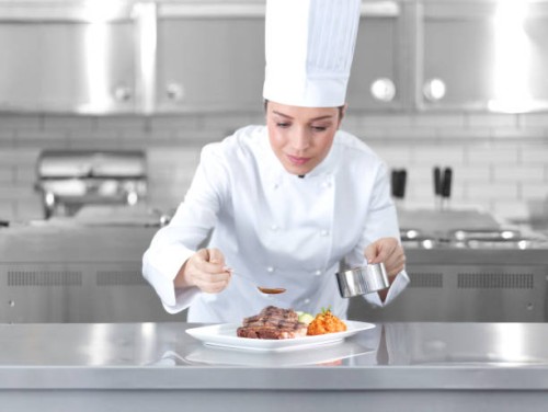 female chef preparing steak plate - food stock pictures, royalty-free photos & images