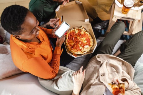 female friends ordering food online - junk food stock pictures, royalty-free photos & images