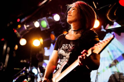 female guitarist - concert stock pictures, royalty-free photos & images