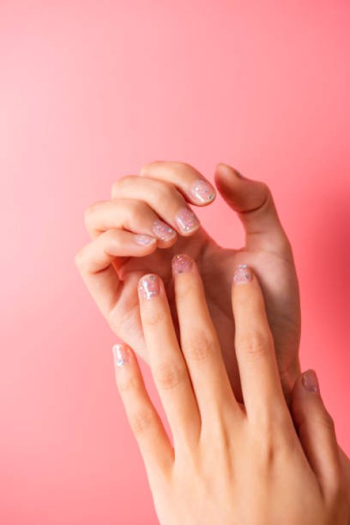 female hands with nail design. beautiful manicure in gentle tones. - nails art stock pictures, royalty-free photos & images