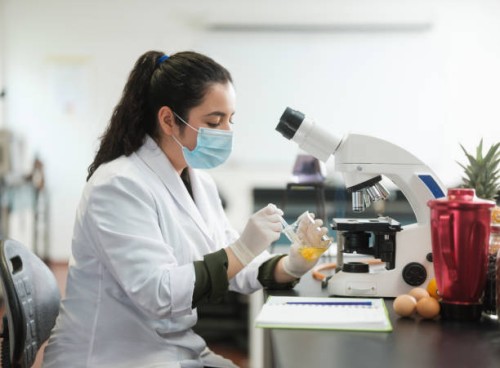female lab student wearing protection for experiment - food stock pictures, royalty-free photos & images