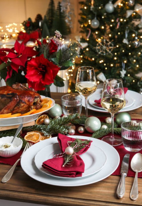 festive christmas day table with roast turkey and wine - home decoration stock pictures, royalty-free photos & images