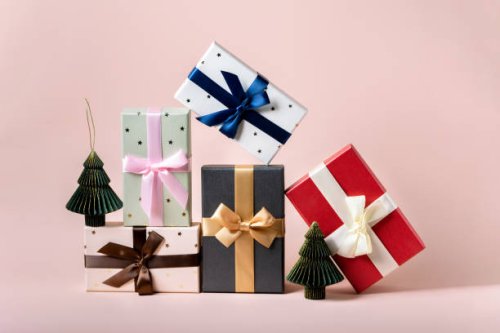 festive christmas new year background colorful gift boxes and holiday decorations on pink background. new year's present and christmas present top view - home decoration stock pictures, royalty-free photos & images