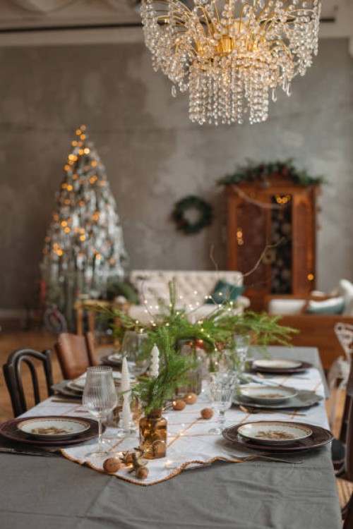 festive christmas table setting in an elegant open plan living and dinning room - home decoration stock pictures, royalty-free photos & images