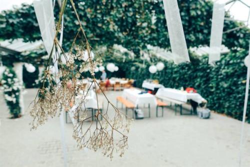 festive decorated table outdoors and white flowers in focus - garden decoration stock pictures, royalty-free photos & images
