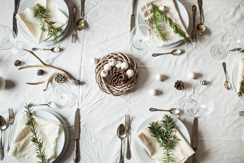 festive laid table at christmas time - home decoration stock pictures, royalty-free photos & images