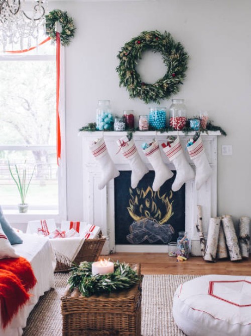 fireplace with stockings - home decoration stock pictures, royalty-free photos & images