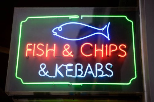fish and chip shop sign - junk food stock pictures, royalty-free photos & images
