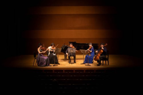 five musicians playing violin, viola, and cello at classical music concert - concert stock pictures, royalty-free photos & images
