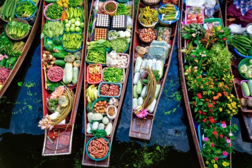floating market on a canal in thailand,vegetables and fruit - food stock pictures, royalty-free photos & images