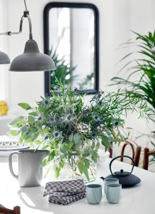 flowers on dining table - home decoration stock pictures, royalty-free photos & images