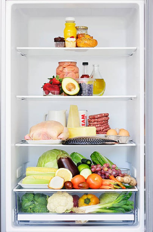 food forming a food pyramid in a fridge - food stockfoto's en -beelden