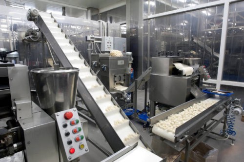 food moving through production line in factory - food stock pictures, royalty-free photos & images