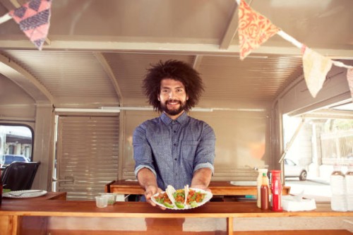 food truck owner - junk food stock pictures, royalty-free photos & images