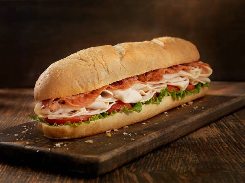 foot long turkey and bacon sub - junk food stock pictures, royalty-free photos & images