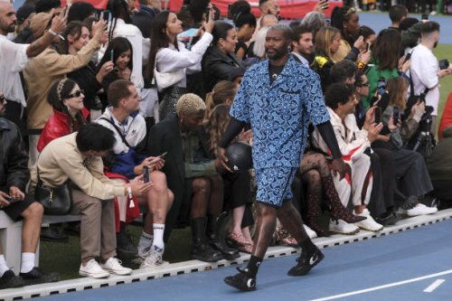 Footbaler Djibril Cissé walks the runway during the Marine Serre Menswear Spring Summer 2023 show as part of Paris Fashion Week on June 25, 2022 in...