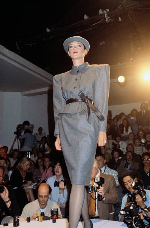 French designer Pierre Cardin shows his 1979-1980 fall-winter women's haute couture collection in Paris. The model is wearing a structured grey...