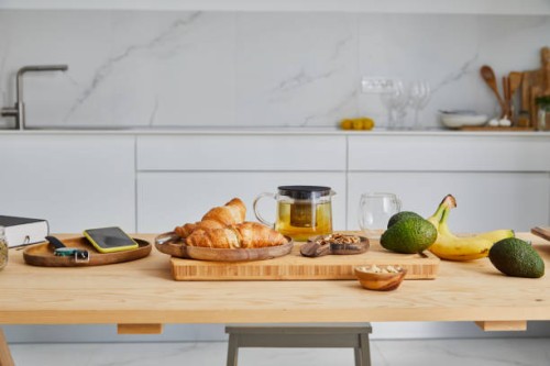 fresh croissants on the kitchen table - food stock pictures, royalty-free photos & images