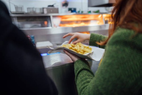 fresh from the fryer - junk food stock pictures, royalty-free photos & images