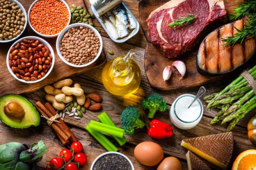 fresh healthy organic food for balanced diet on wooden table - food stock pictures, royalty-free photos & images