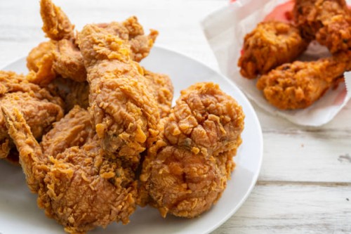 fried chickens - junk food stock pictures, royalty-free photos & images