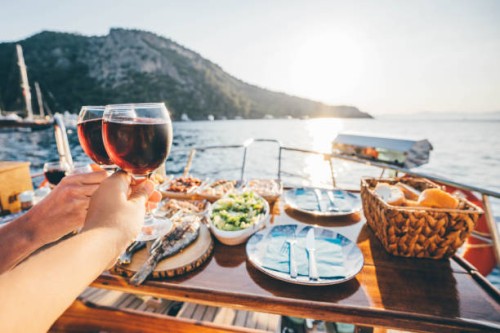 friend drinking wine on the yacht at sunset. toasting on a yacht. - food stock pictures, royalty-free photos & images