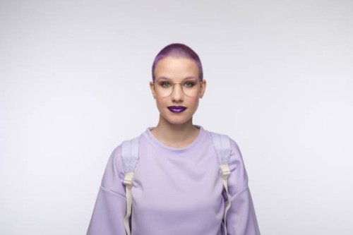 friendly female student with short purple hair - fashion stock pictures, royalty-free photos & images
