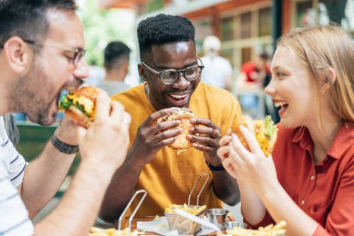 friends and fast food - junk food stock pictures, royalty-free photos & images