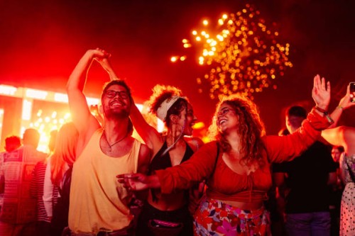friends celebrating on a night out. - concert stock pictures, royalty-free photos & images