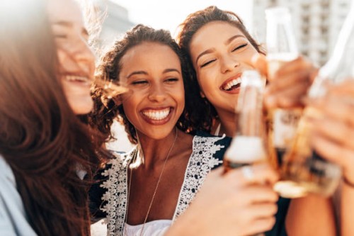 friends cheering with beer - concert stock pictures, royalty-free photos & images