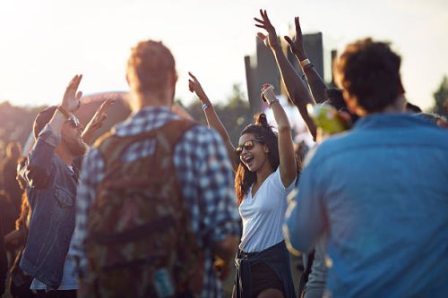 friends dancing together at festival concert - concert stock pictures, royalty-free photos & images