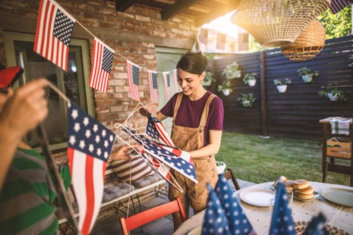 friends decorating backyard for celebration - garden decoration stock pictures, royalty-free photos & images