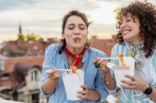 friends eating fast food meal and hanging out - junk food stock pictures, royalty-free photos & images