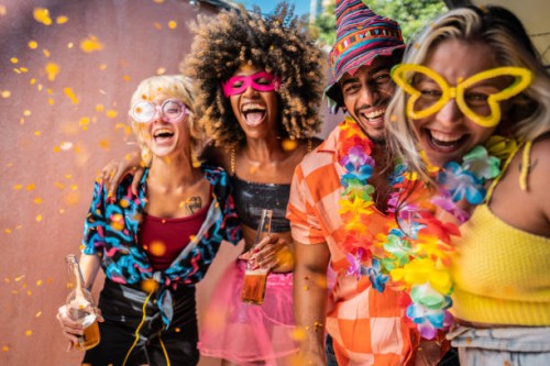 friends enjoying carnival at home - garden decoration stock pictures, royalty-free photos & images