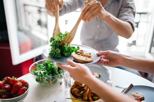 friends enjoying lunch - food stock pictures, royalty-free photos & images