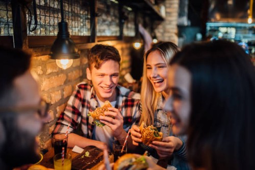friends having a meal together - food stock pictures, royalty-free photos & images