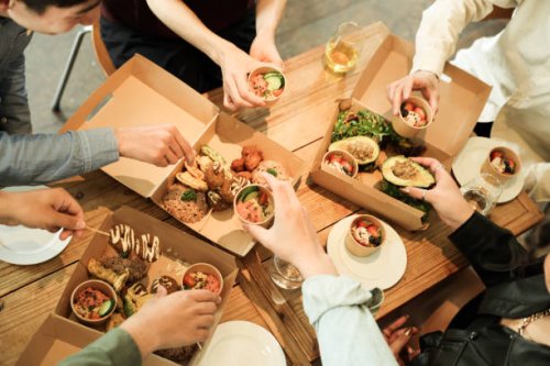 friends having home party with vegan food - junk food stock pictures, royalty-free photos & images