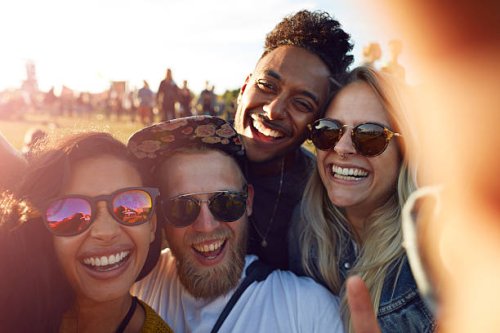 friends making selfie at big festival - concert stock pictures, royalty-free photos & images