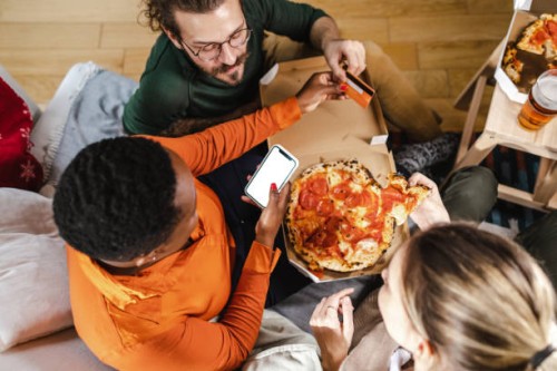 friends ordering food online - junk food stock pictures, royalty-free photos & images