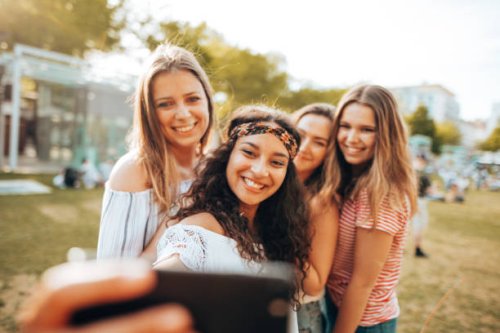 friends take a selfie in the park - concert stock pictures, royalty-free photos & images
