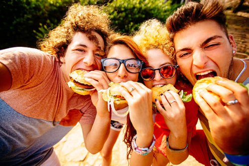 friends taking selfie with hamburgers - junk food stock pictures, royalty-free photos & images