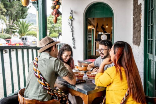 friends talking while eat at a coffee shop - food stock pictures, royalty-free photos & images