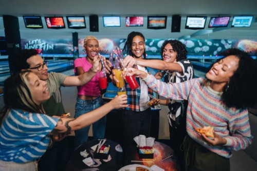 friends toasting at a bowling club - food stock pictures, royalty-free photos & images