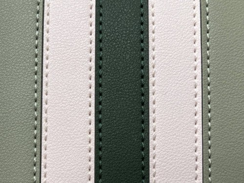 front details of a two-toned green handbag - fashion stock pictures, royalty-free photos & images
