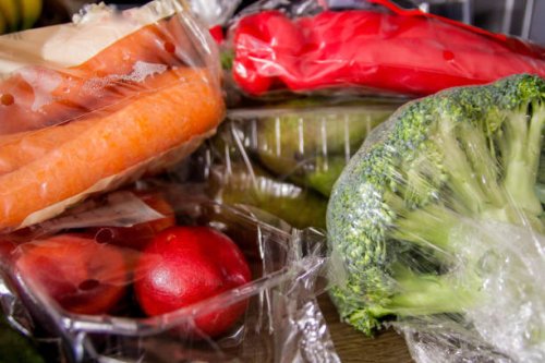 fruit and vegetables in plastic bags - food stock pictures, royalty-free photos & images