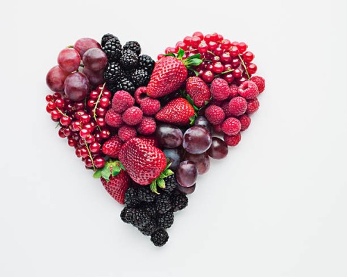 fruit forming heart-shape - food stock pictures, royalty-free photos & images