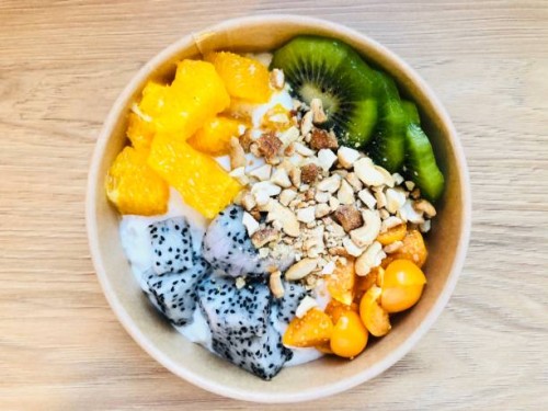 fruit salad with yogurt and nuts - junk food stock pictures, royalty-free photos & images