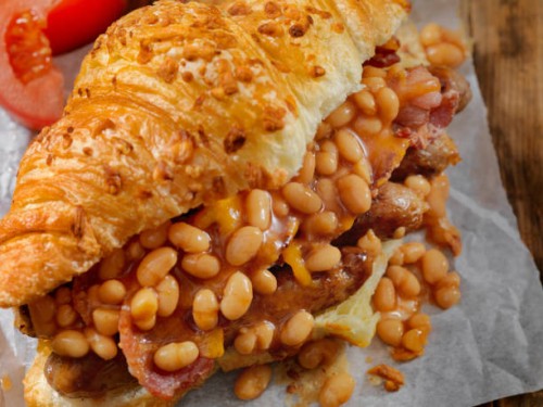 full english breakfast croissant sandwich - junk food stock pictures, royalty-free photos & images