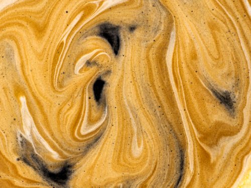 full frame, textures of the cream of a cup of fresh coffee. - coffee stock pictures, royalty-free photos & images